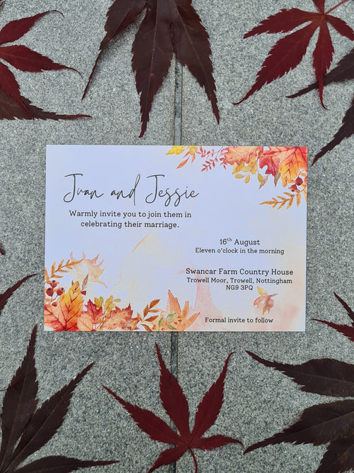 ALÈCLEE Designs - Falling in Love Wedding Stationery Collection. A stylish Save-the-Date featuring romantic, rich autumn foliage, elegant calligraphy, and refined modern typography. Inspired by the tones and textures of the season, this design sets a beautiful tone for a heartfelt autumn celebration.